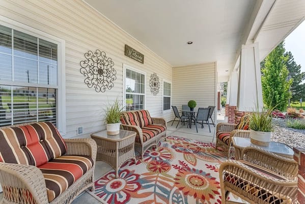 Outdoor seating area with colorful decor