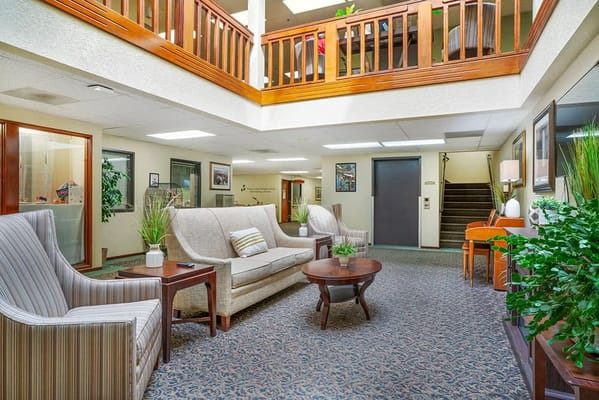 Bright common area with seating and decor