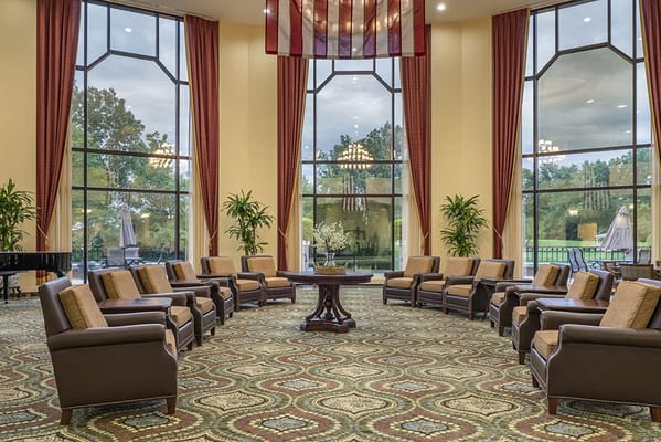 Common area with seating and large windows