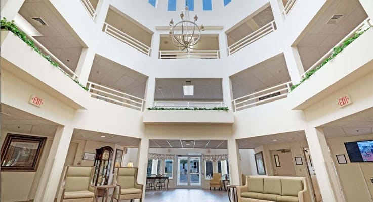 Spacious lobby with high ceiling and natural light