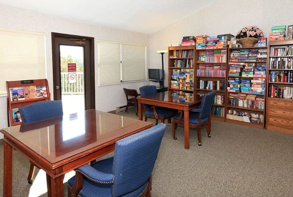 Interior room with tables and bookshelves