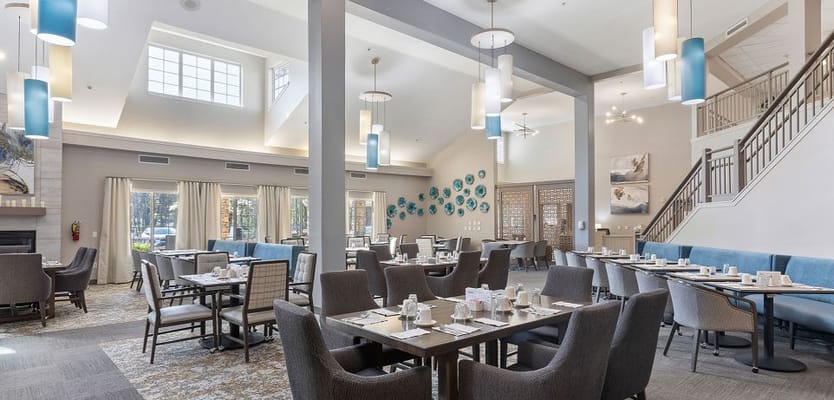Bright dining area with tables set for meals