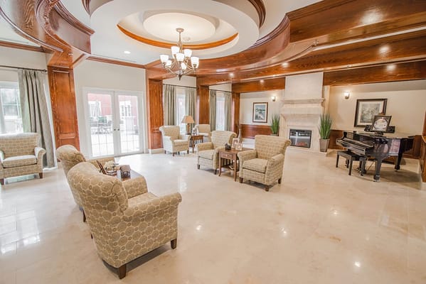 Elegant common area with seating and a piano