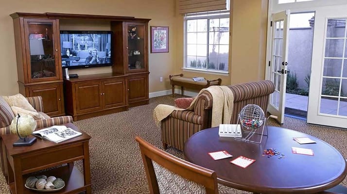 Activity room with seating and a television