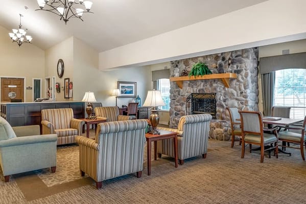 Common area with seating and a fireplace