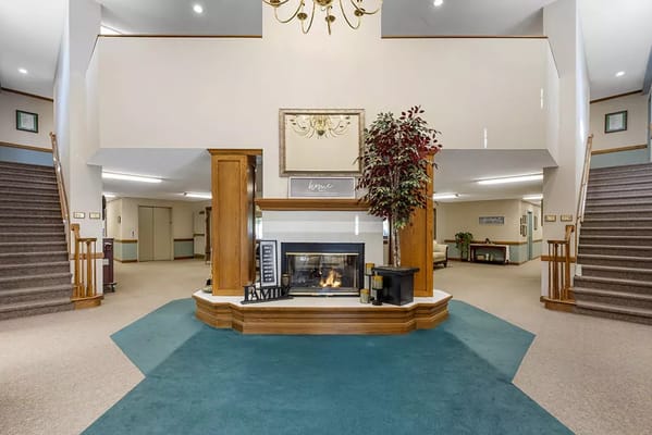 Interior view of a common area with a fireplace