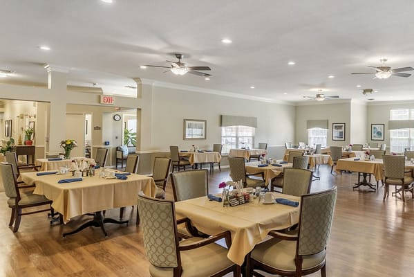 Dining room with tables set for meals