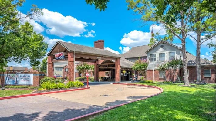 Exterior view of Lone Star Living entrance with garden