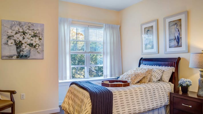 Cozy resident room with bed and decor