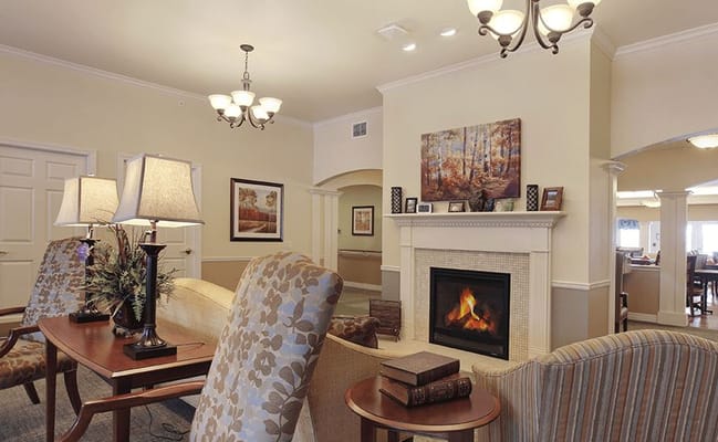 Comfortable common area with seating and fireplace
