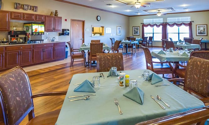 Dining area with tables set for meals