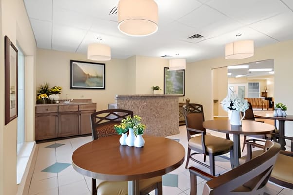 Bright common area with tables and chairs