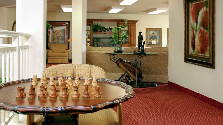 Interior view of a common area with a chess table