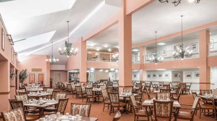 Dining room with neatly arranged tables and chairs