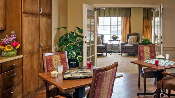 Bright common area with seating and plants