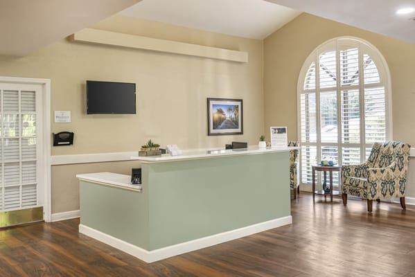 Bright interior lobby area with reception desk