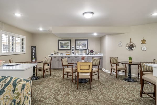 Bright common area with seating and decor