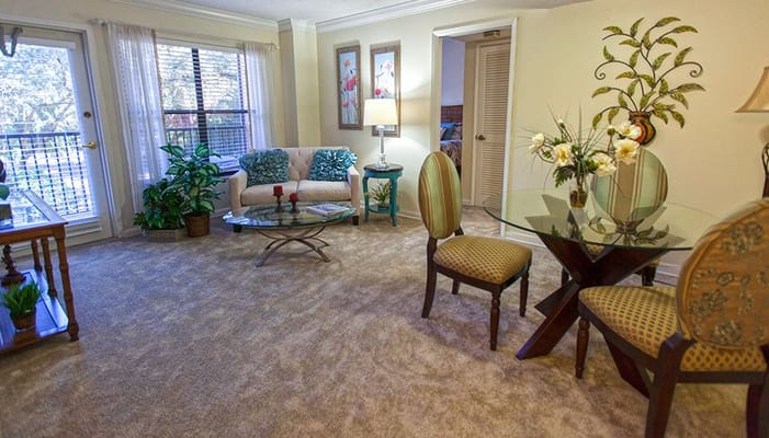 Cozy living area in a well-lit resident room