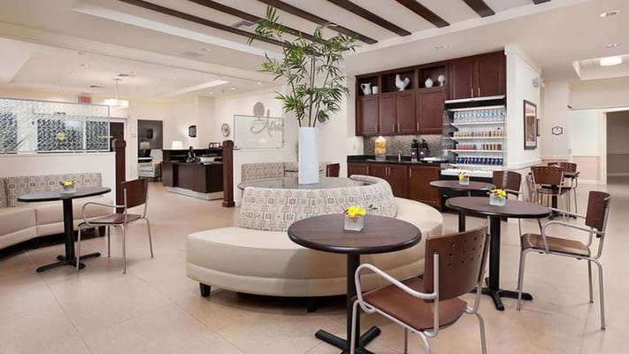 Bright common area with comfortable seating and decor