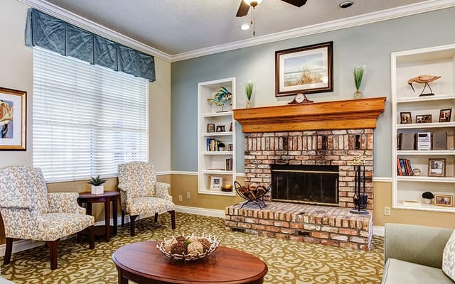 Cozy common area with a fireplace and comfortable seating