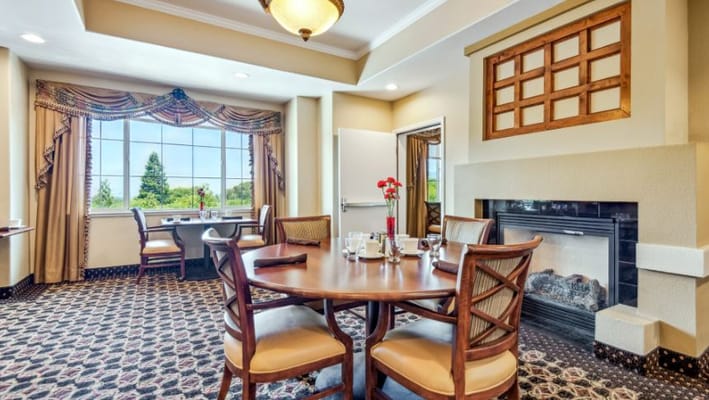 Dining room with tables set for residents