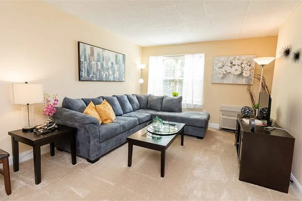 A cozy living room with a large sectional sofa