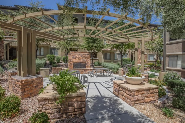 Well-maintained outdoor space with seating and landscaping