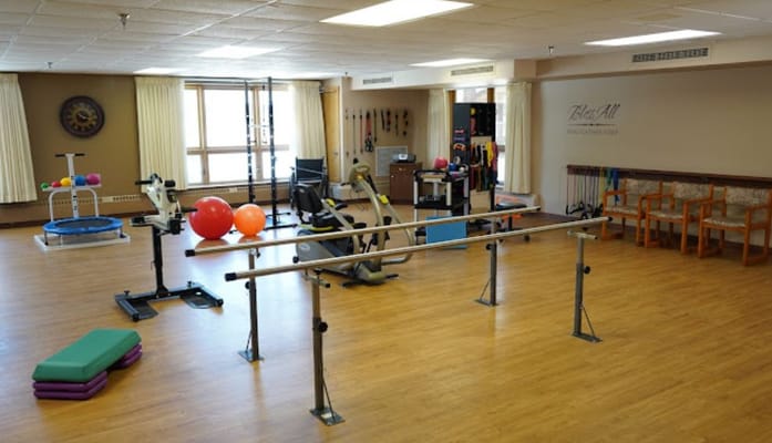 Interior of a therapy room with exercise equipment