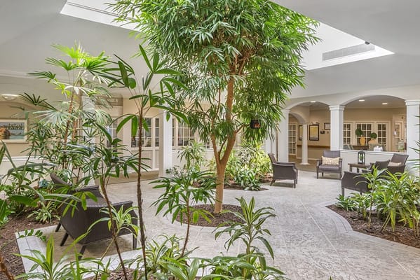 Indoor common area with plants and seating