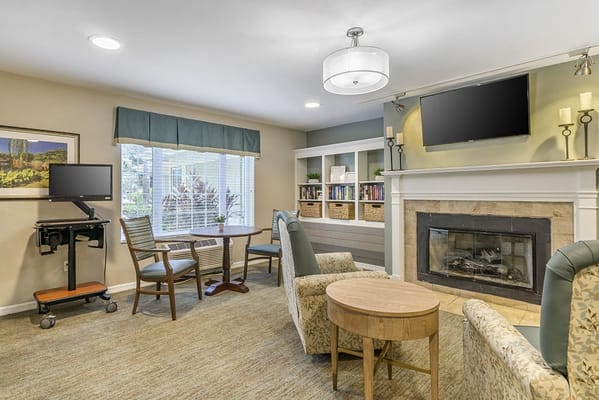 Interior common area with seating and fireplace