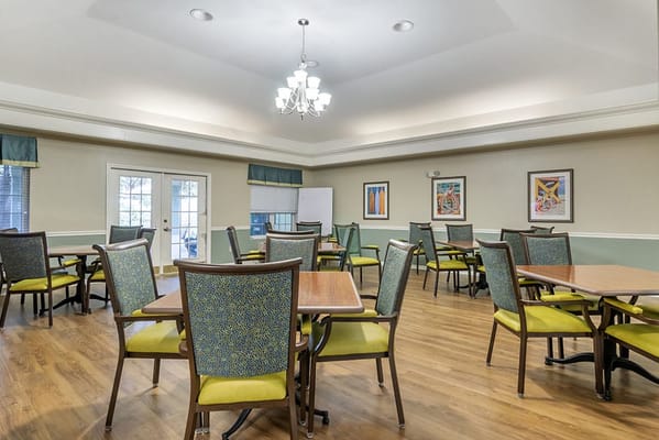 Bright interior common area with tables and chairs