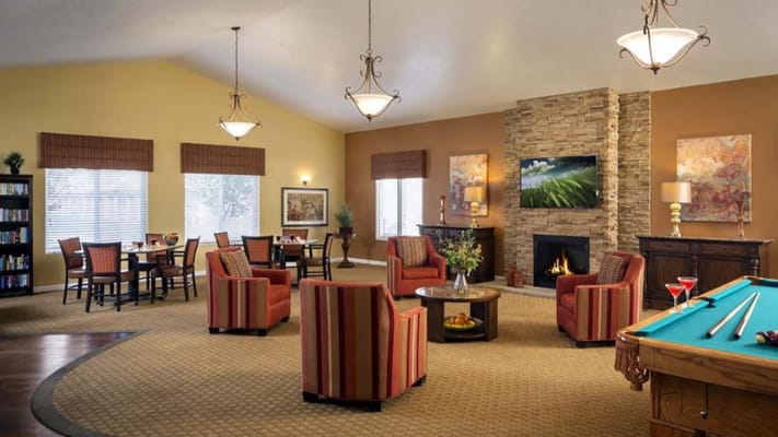 Bright common area with comfortable seating and decor
