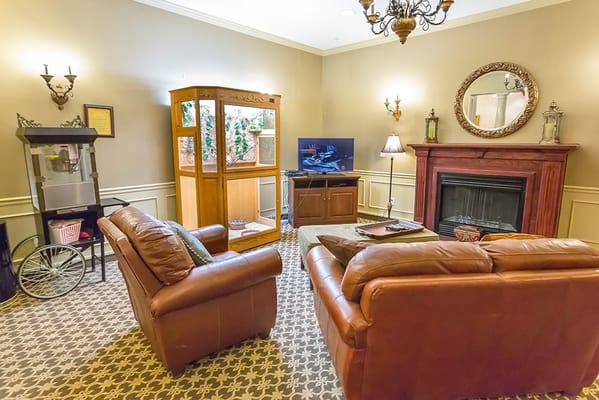 Cozy common area with seating and a fireplace