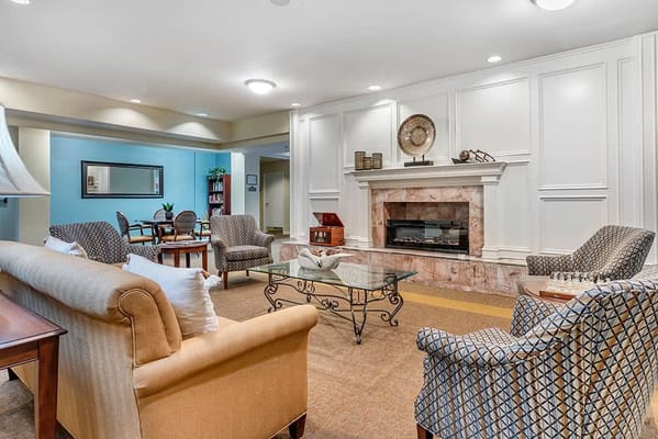 Comfortable lounge area with a fireplace and seating