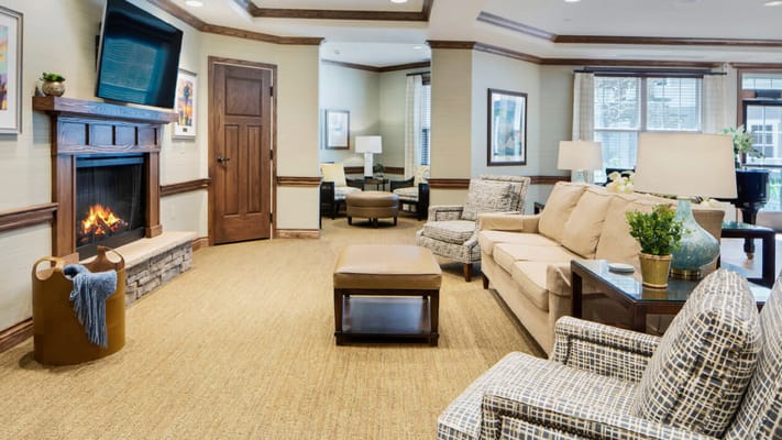 Cozy common area with seating and a fireplace