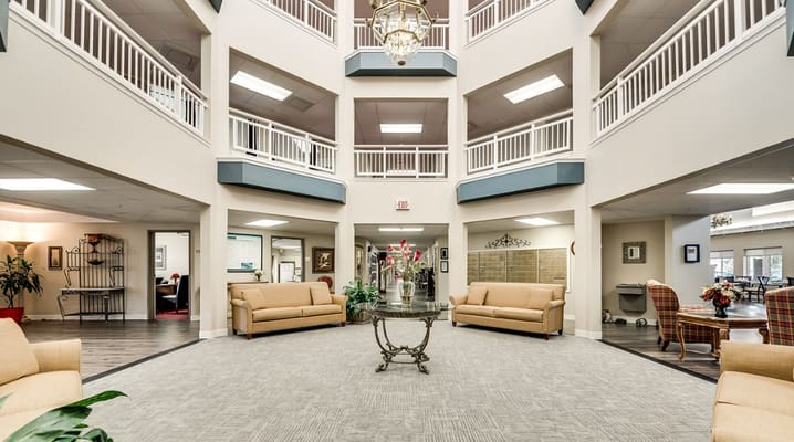 Lobby with seating and decorative centerpiece