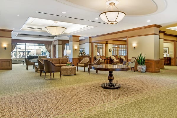 Interior common area with seating and natural light