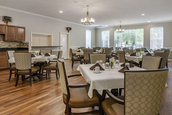 Dining area with tables set for meals
