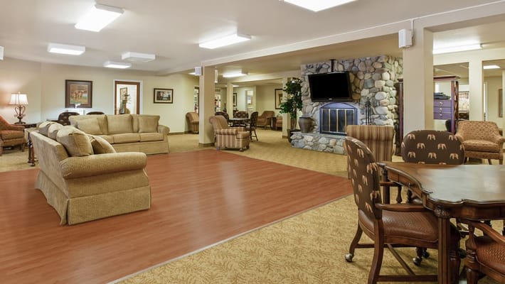 Common area lounge with seating and fireplace