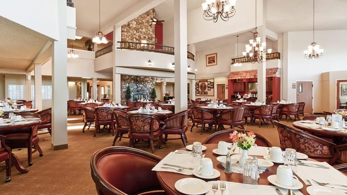 Elegant dining room layout with set tables