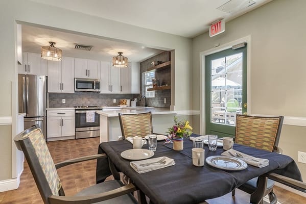 Dining area with a table set for meals