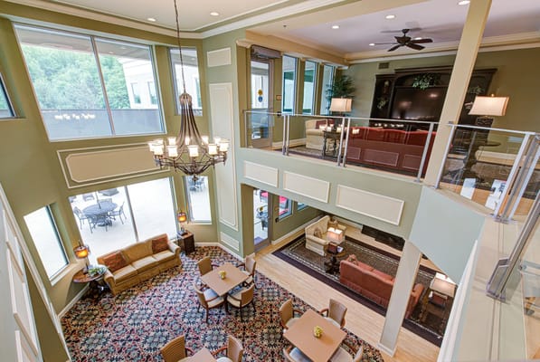 Bright and spacious lobby with seating areas and large windows