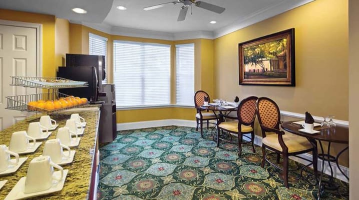 Cozy dining area with tables and chairs