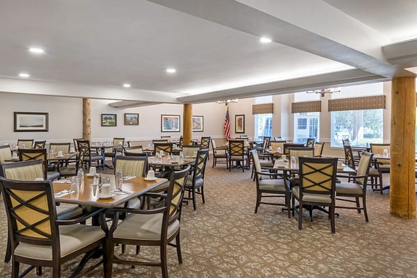 Bright dining room with neatly set tables