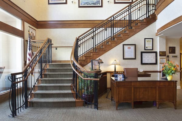 Interior view of facility lobby with a staircase
