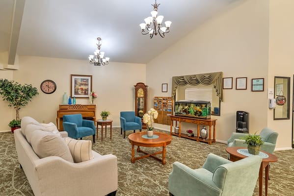 Cozy common area with seating and fish tank