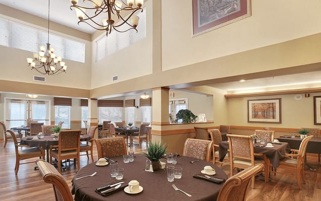 Dining area with tables set for meals