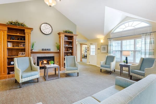 Common area with seating and fireplace