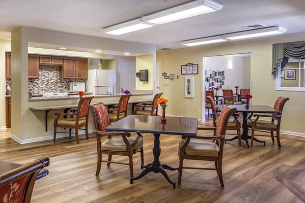 Interior common area with tables and chairs