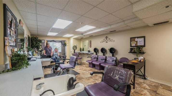 Salon area with styling chairs and residents